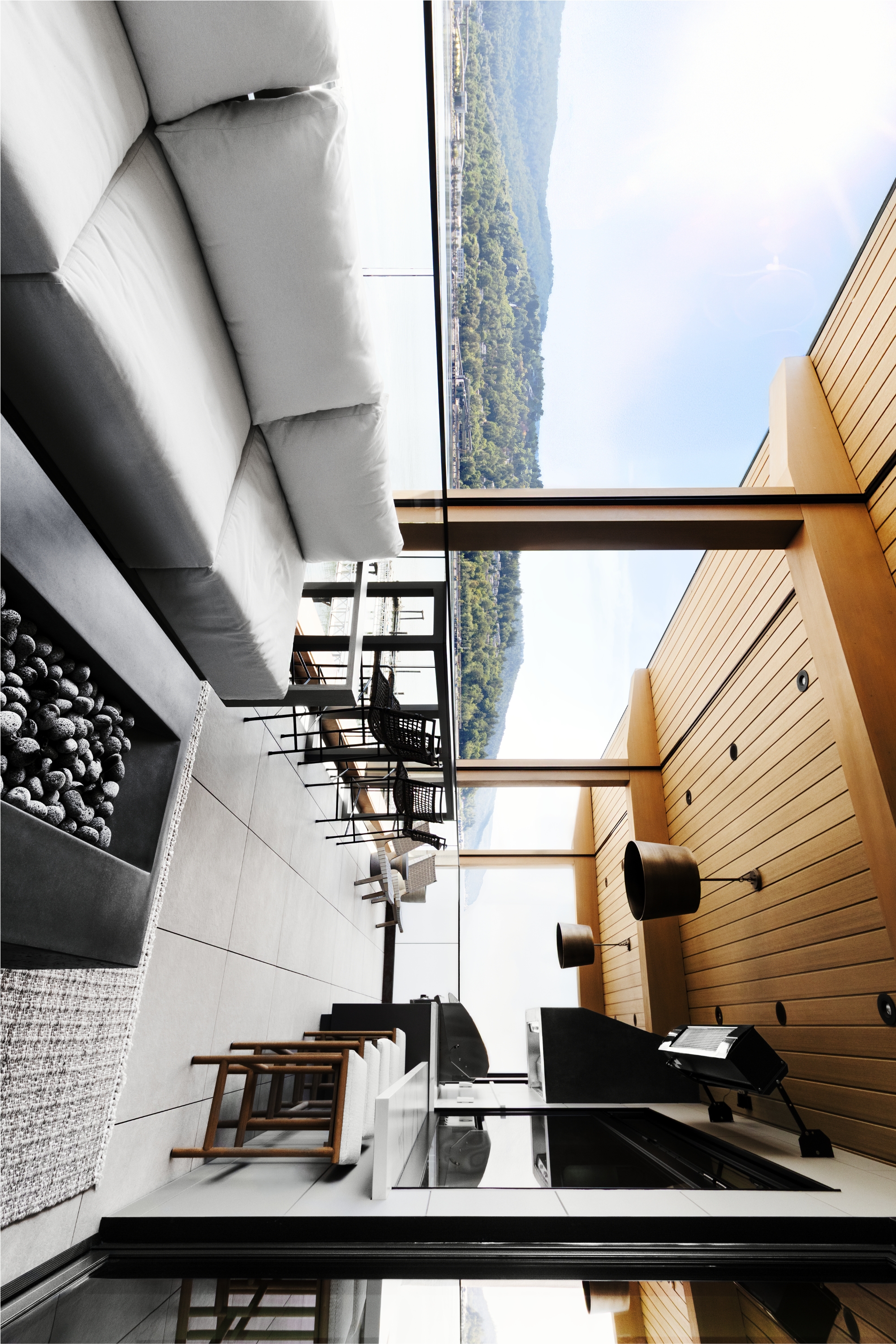 Integrated outdoor living with televisions, lighting, and heating
