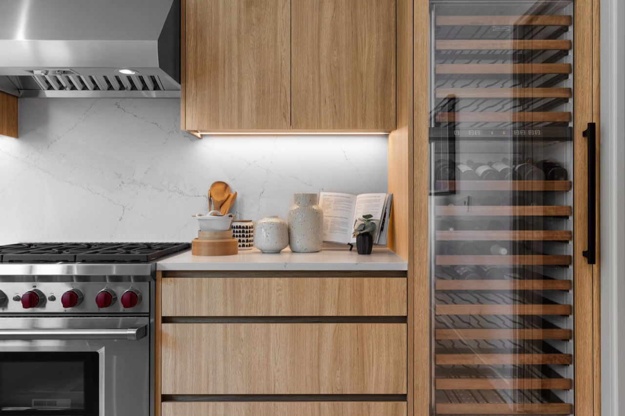 Concealed task lighting illuminating a residential kitchen work surface